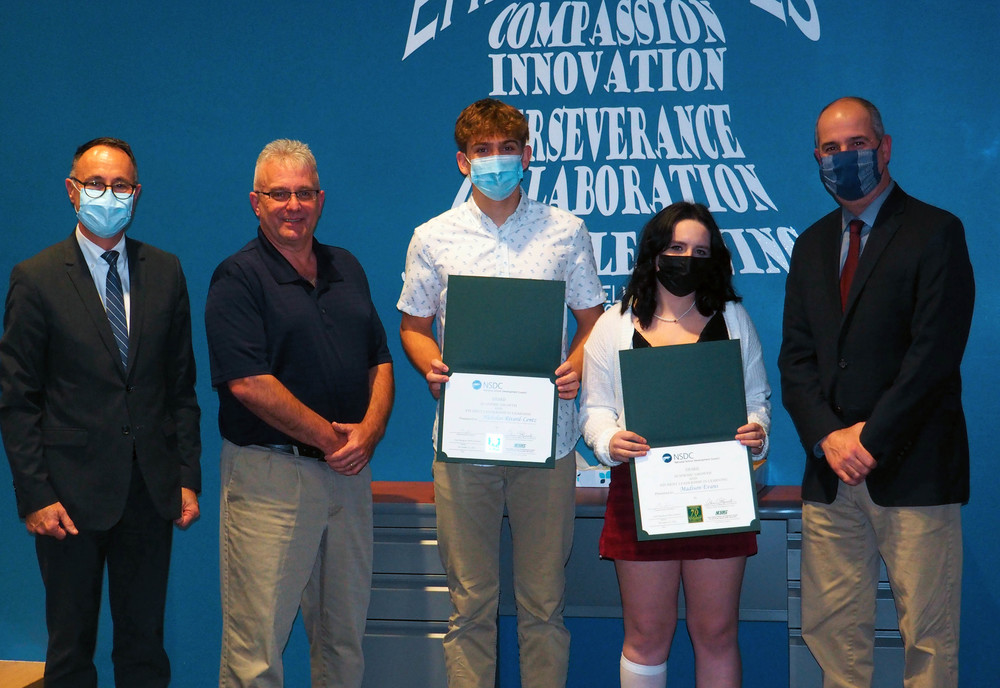 Students being recognized by BOE
